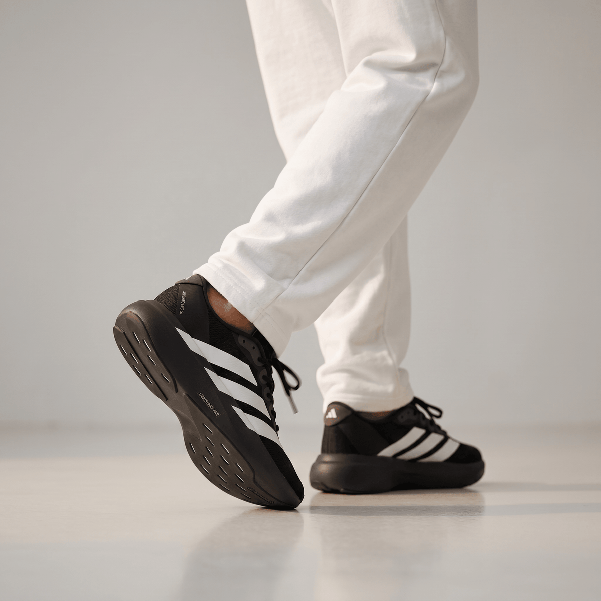 ⚡🖤 Adidas Adizero Lightweight Performance Running Sneakers – Black & White Athletic Racing Shoes 👟🔥 - MASTERPIECE
