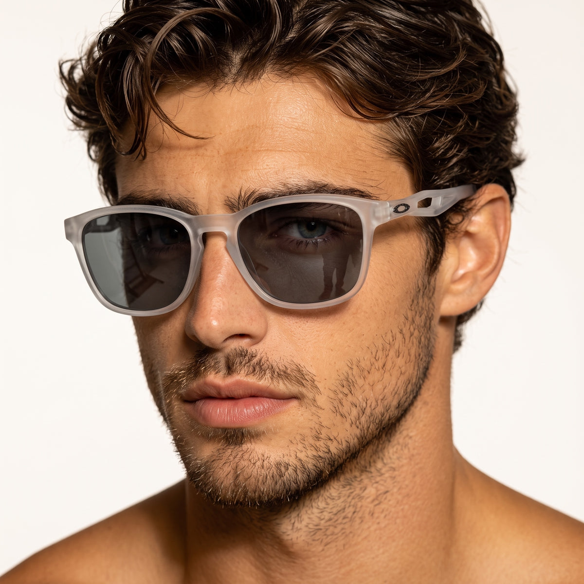 Oakley frosted translucent grey rectangular sunglasses with dark lenses