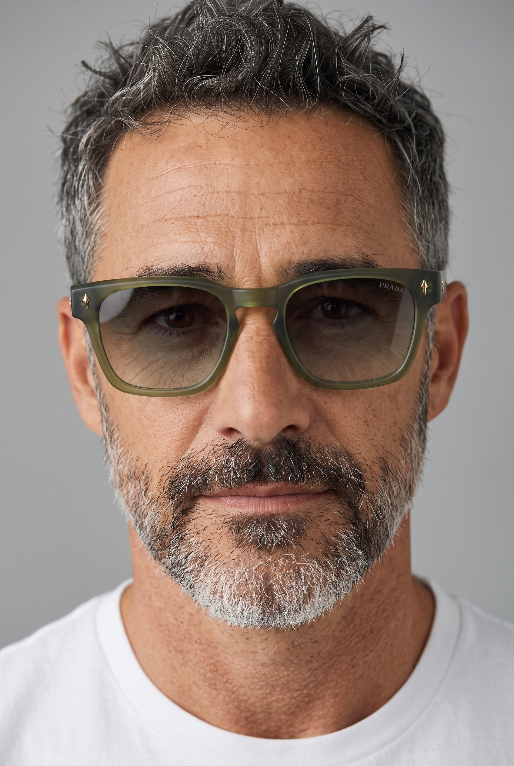 Prada square sunglasses with translucent olive frame and gradient lenses