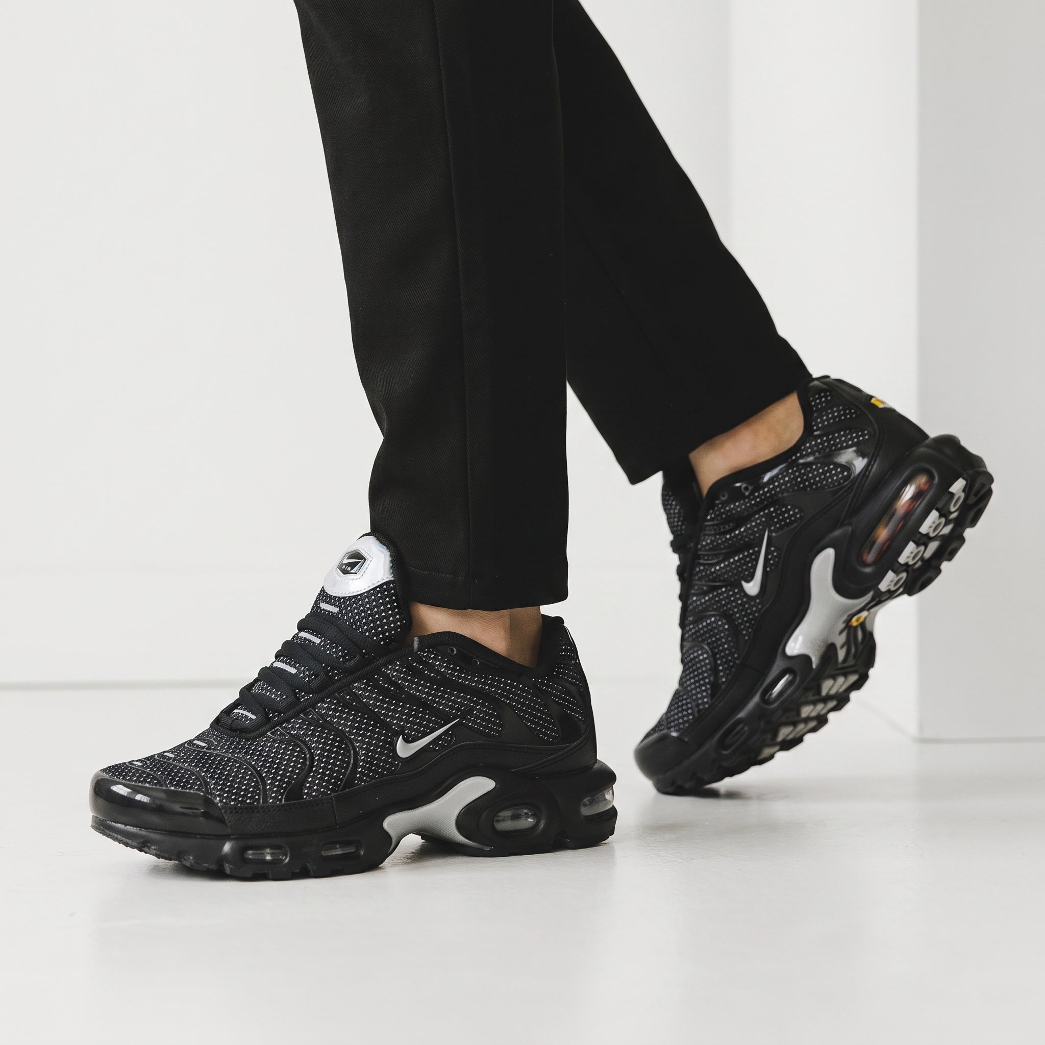 black Nike Tuned Air Max sneakers with visible air units