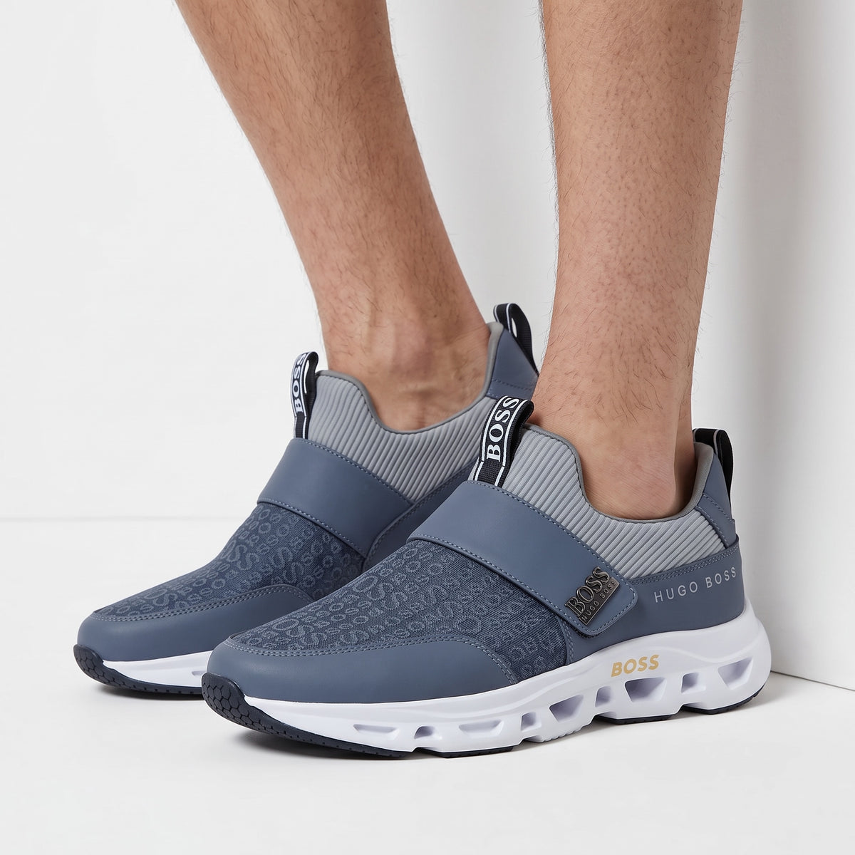 Hugo Boss blue monogram slip-on trainers with chunky white sole