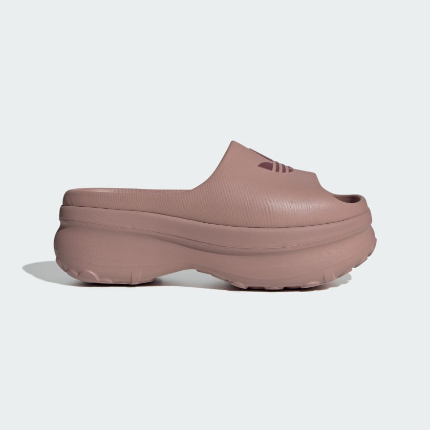 blush pink Adidas platform slide with embossed trefoil logo