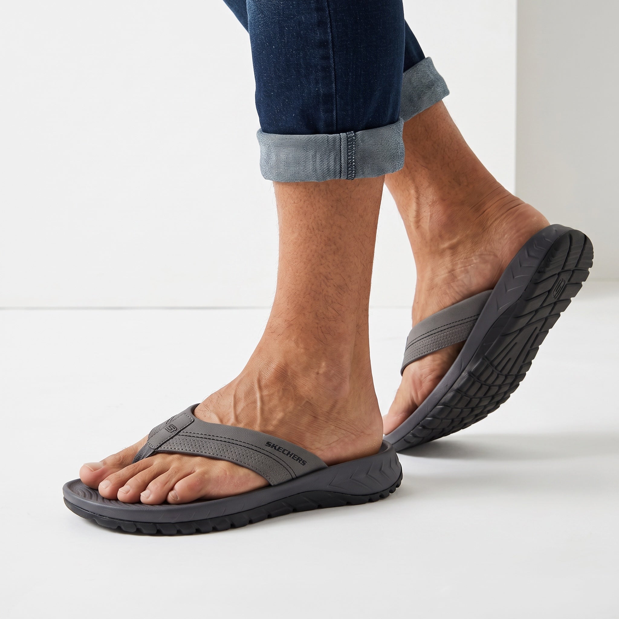 Grey Skechers Recovery men's flip-flop with textured footbed and treaded sole