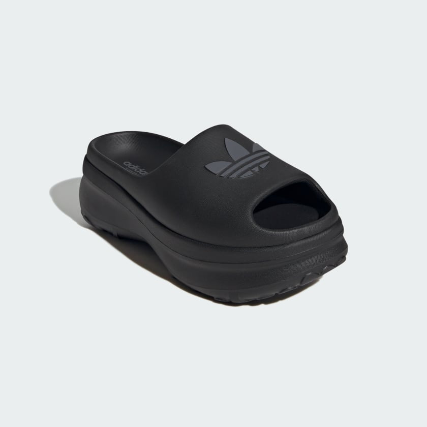 black adidas platform slide sandal with embossed trefoil