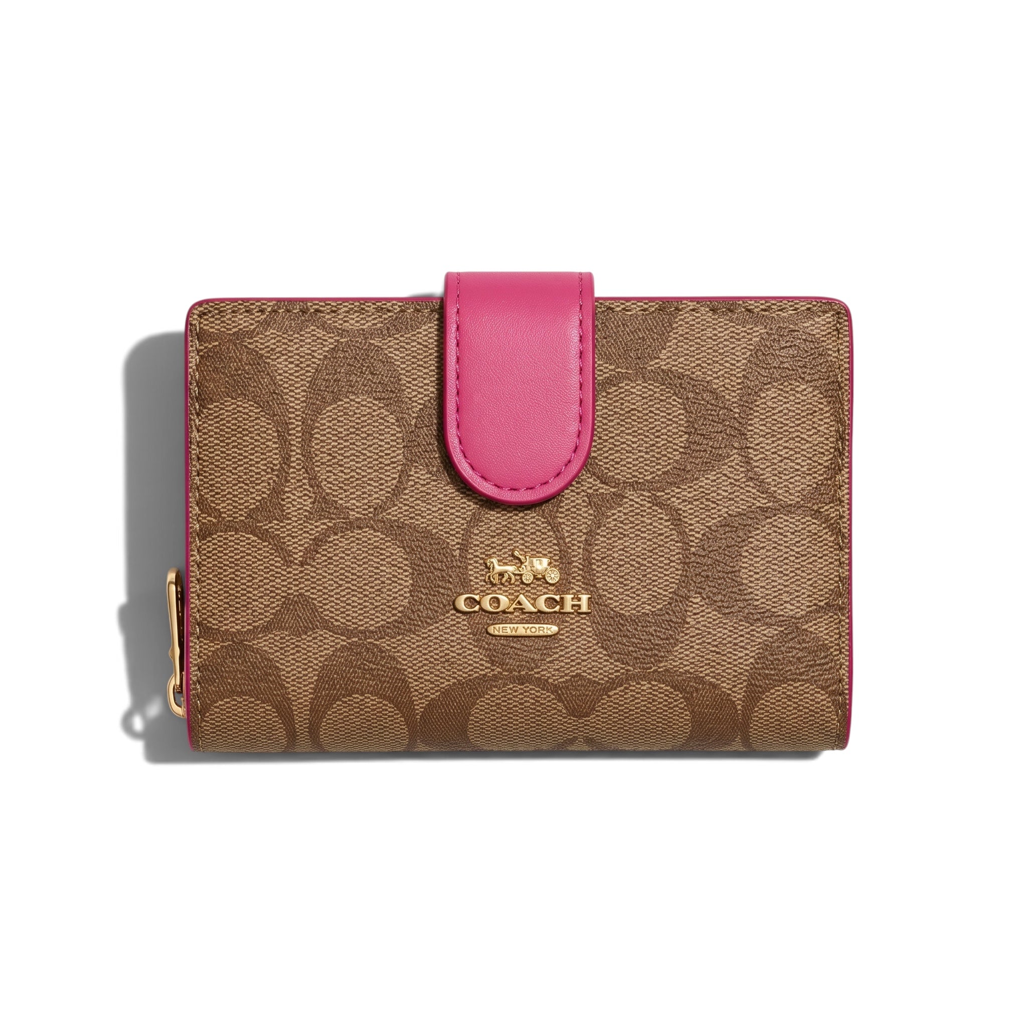 Coach brown signature compact wallet with pink tab and gold logo