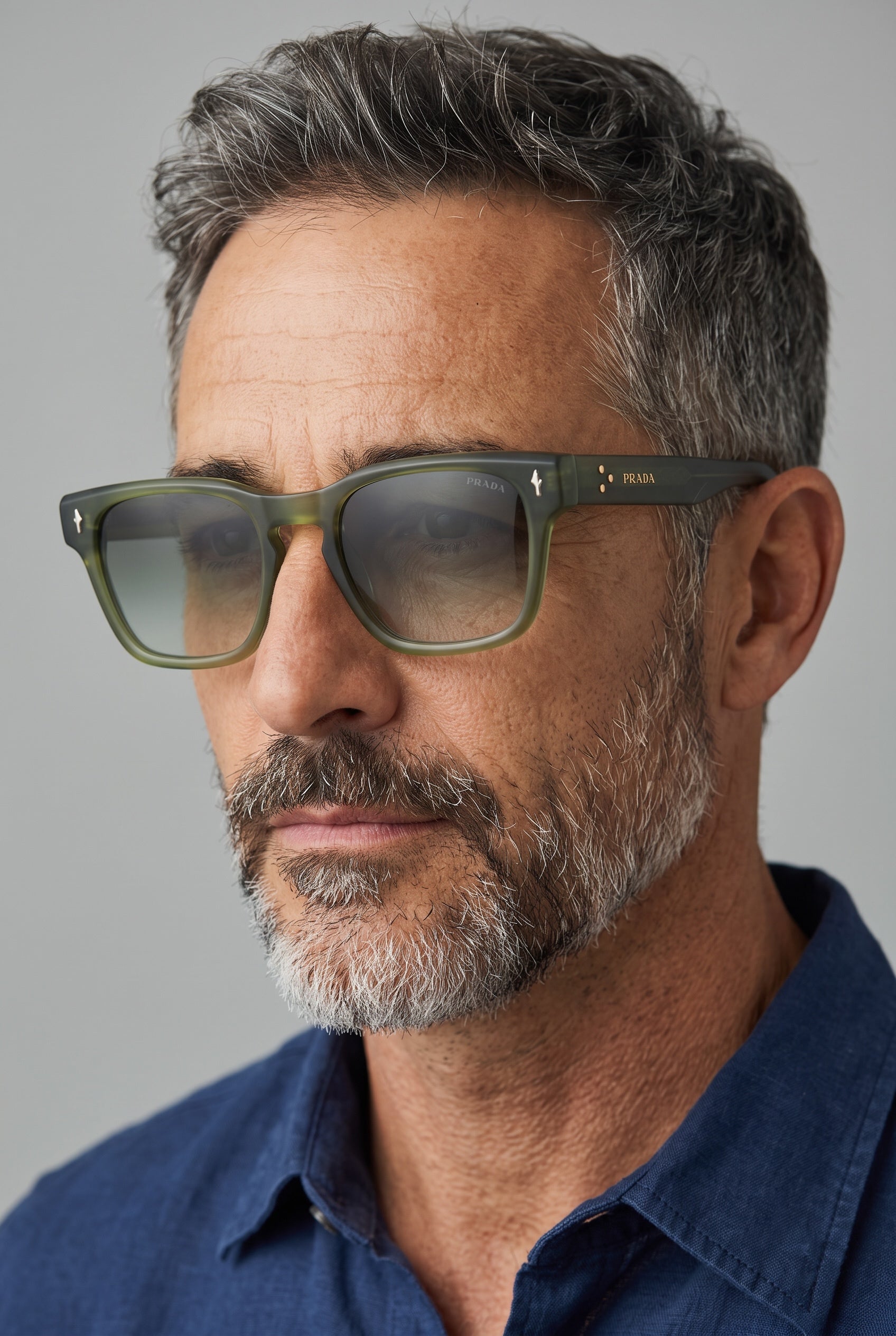 Prada square sunglasses with translucent olive frame and gradient lenses