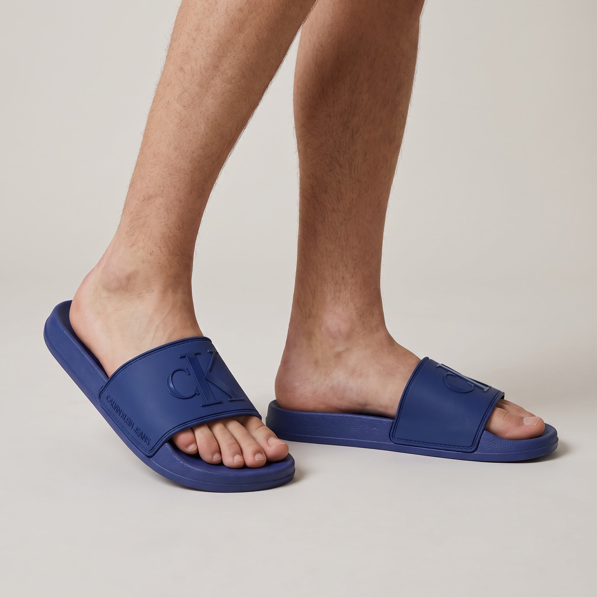 Calvin Klein Logo Pool Slides – Blue 🩵 - MASTERPIECE