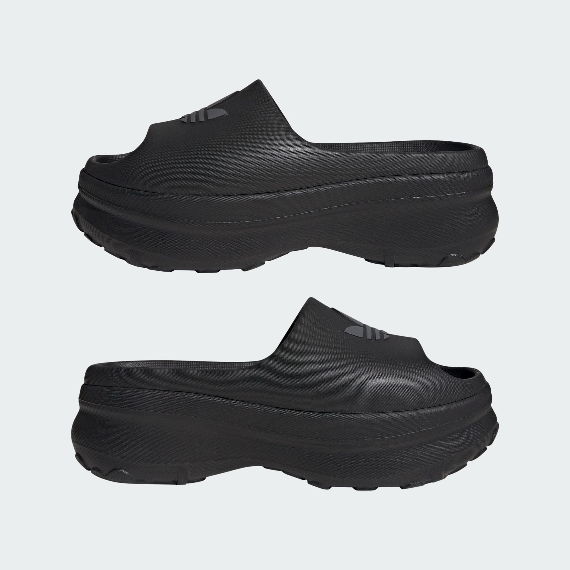 black adidas platform slide sandal with embossed trefoil