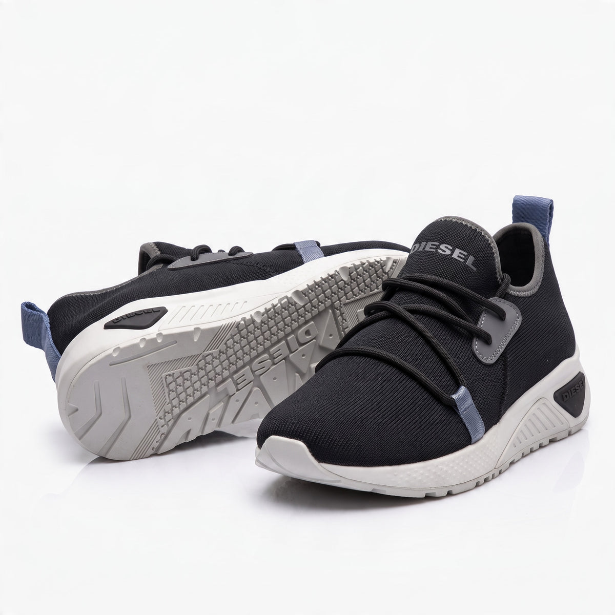 Diesel black low-top knit sneakers with white chunky sole and Diesel logo