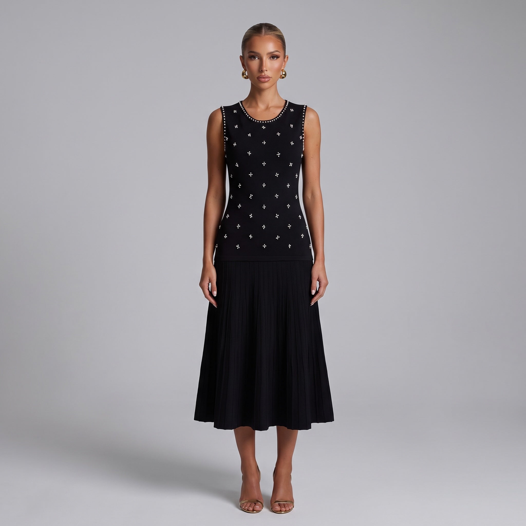 black sleeveless knit tank with pearl-like studs