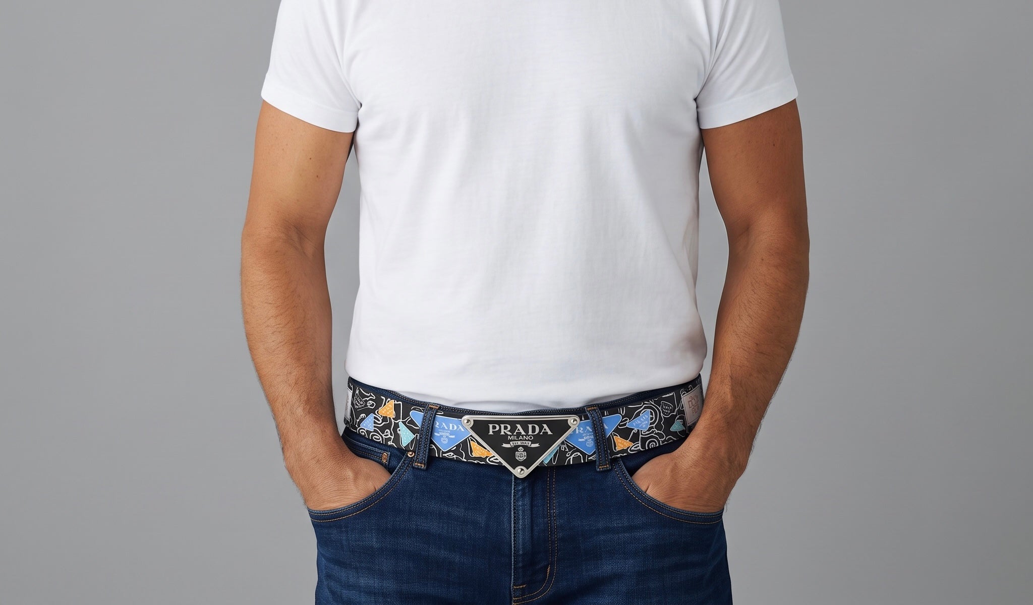Prada black graphic belt with triangular logo plate worn with jeans