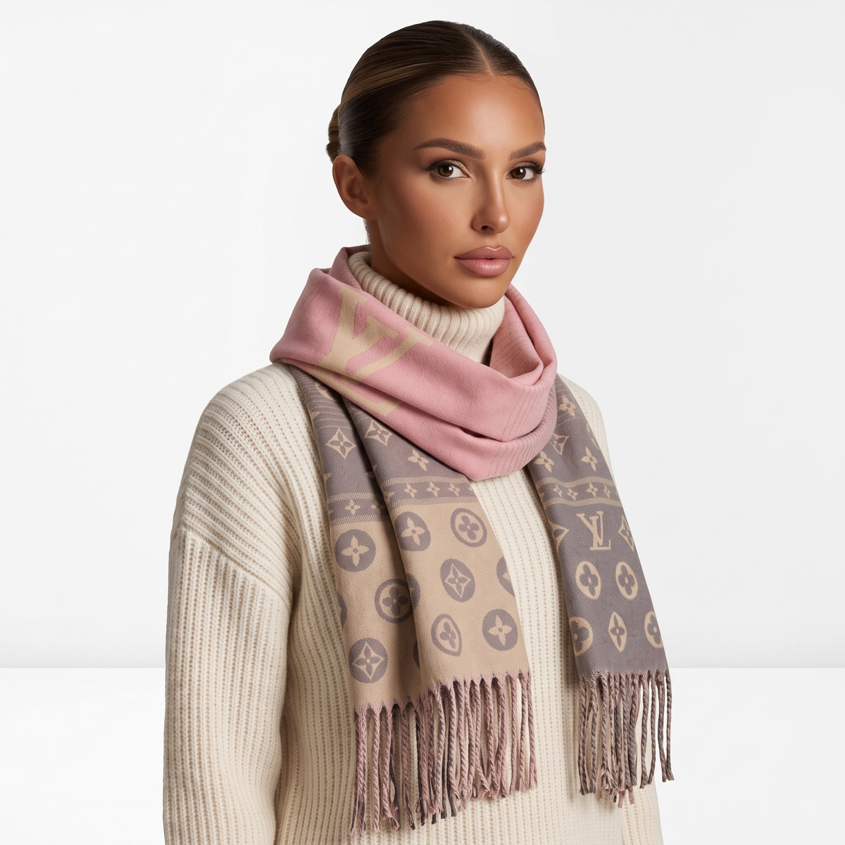 Pink and taupe Louis Vuitton monogram shawl with fringed ends draped around model