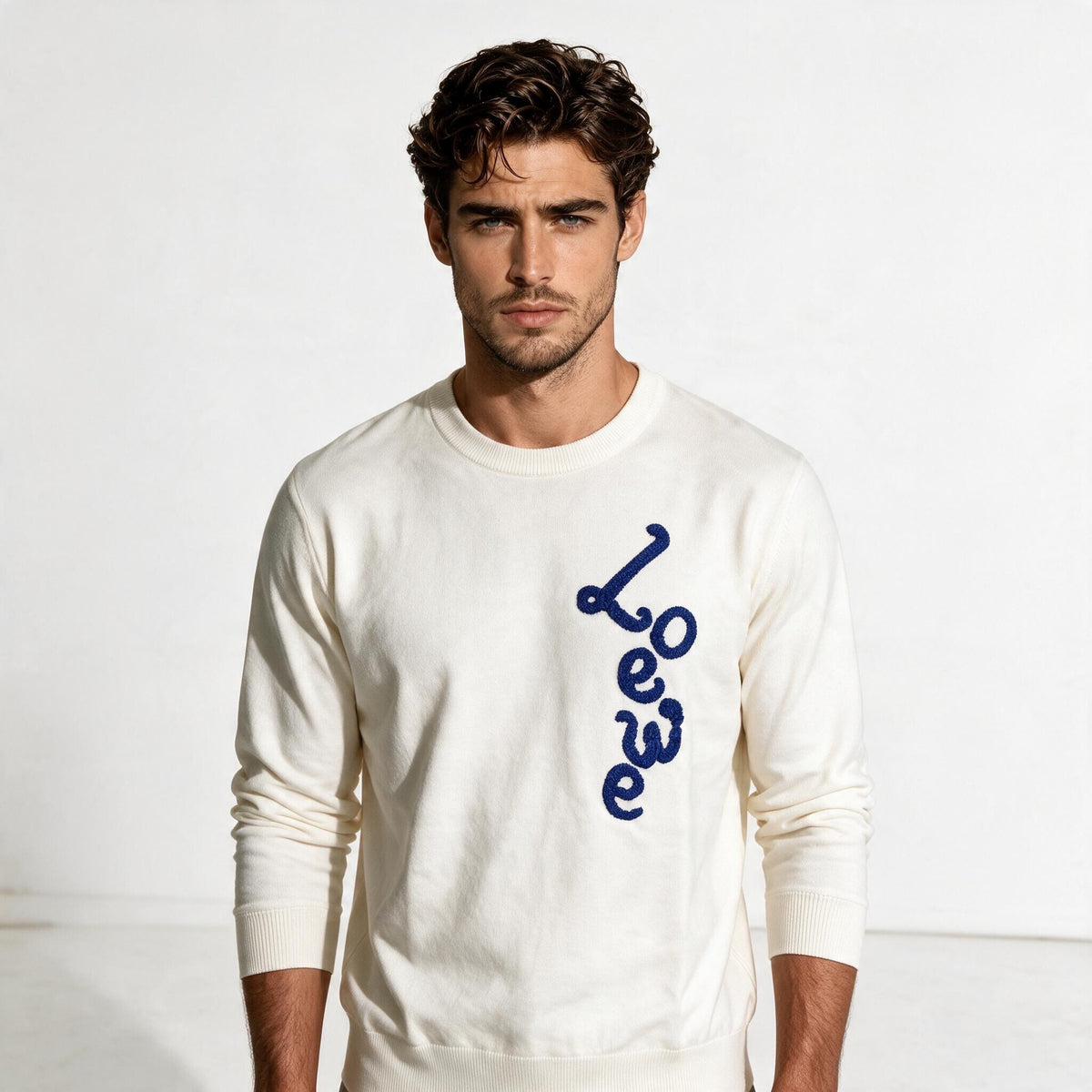 White Loewe crewneck sweatshirt with vertical blue raised logo on front