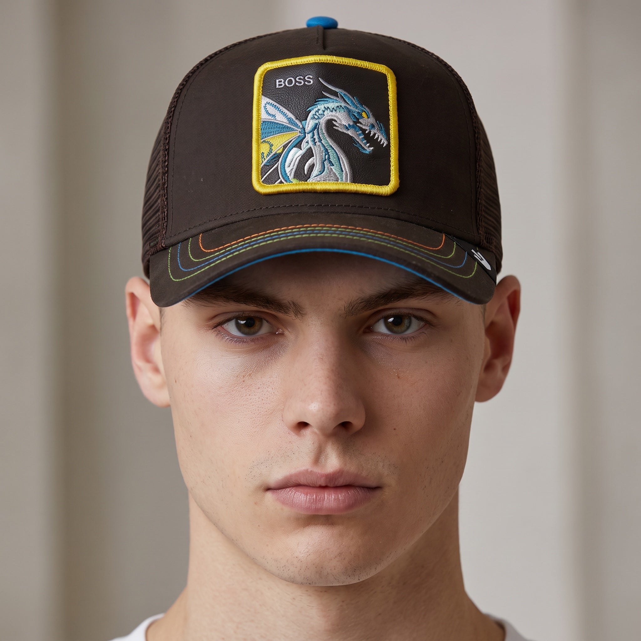 Brown BOSS trucker cap with dragon patch and multicolour stitching