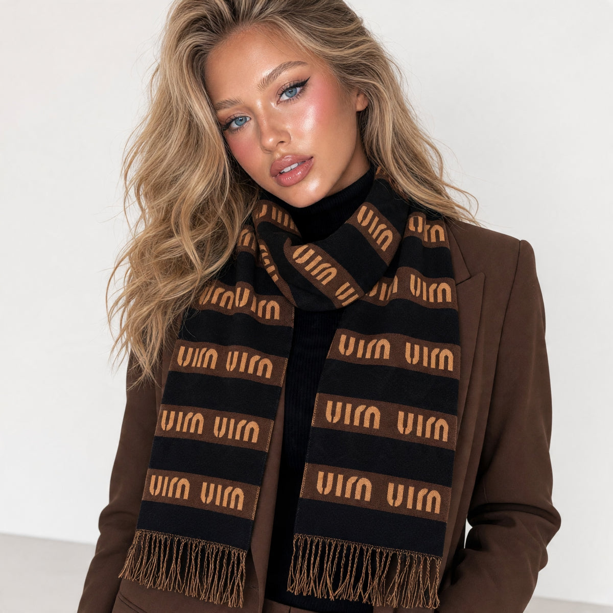 Black and brown Miu Miu knit scarf with repeated logo bands and fringe