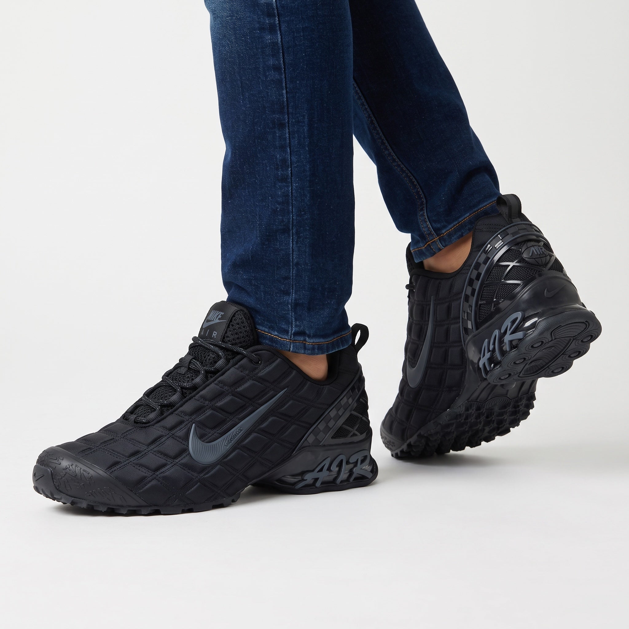 black Nike Air Max Tuned sneakers with quilted upper and visible AIR midsole