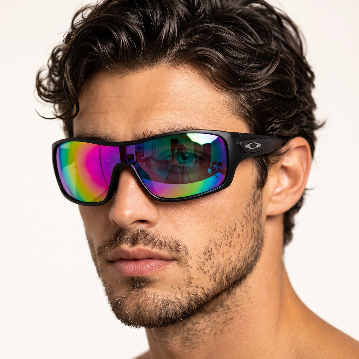 Oakley black wrap shield sunglasses with iridescent lens on male model
