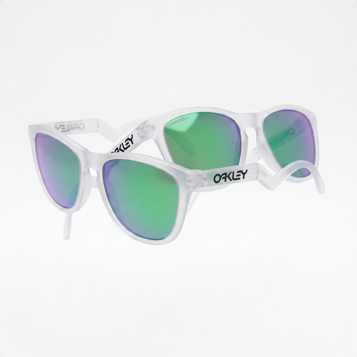 Oakley sunglasses with frosted translucent frames and green mirrored Prizm lenses