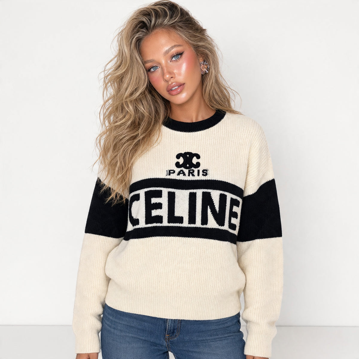 Ivory and black Celine crewneck sweater with large CELINE logo and Triomphe emblem
