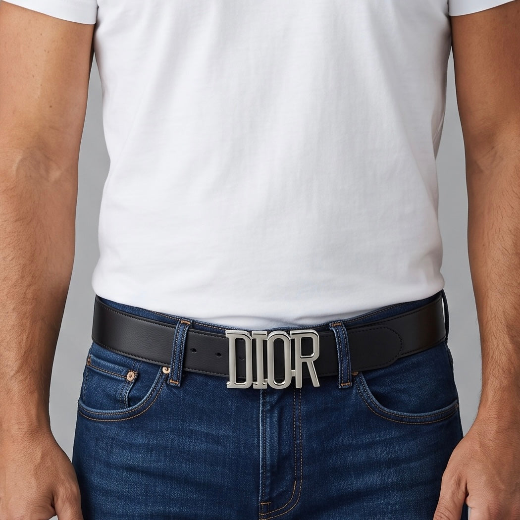 Black Dior belt with silver DIOR logo buckle worn on model with jeans