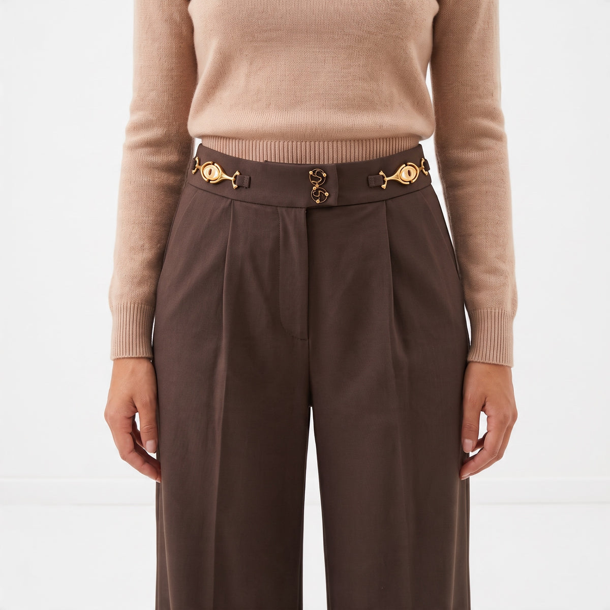 High-waist chocolate brown wide-leg trousers with gold hardware waistband
