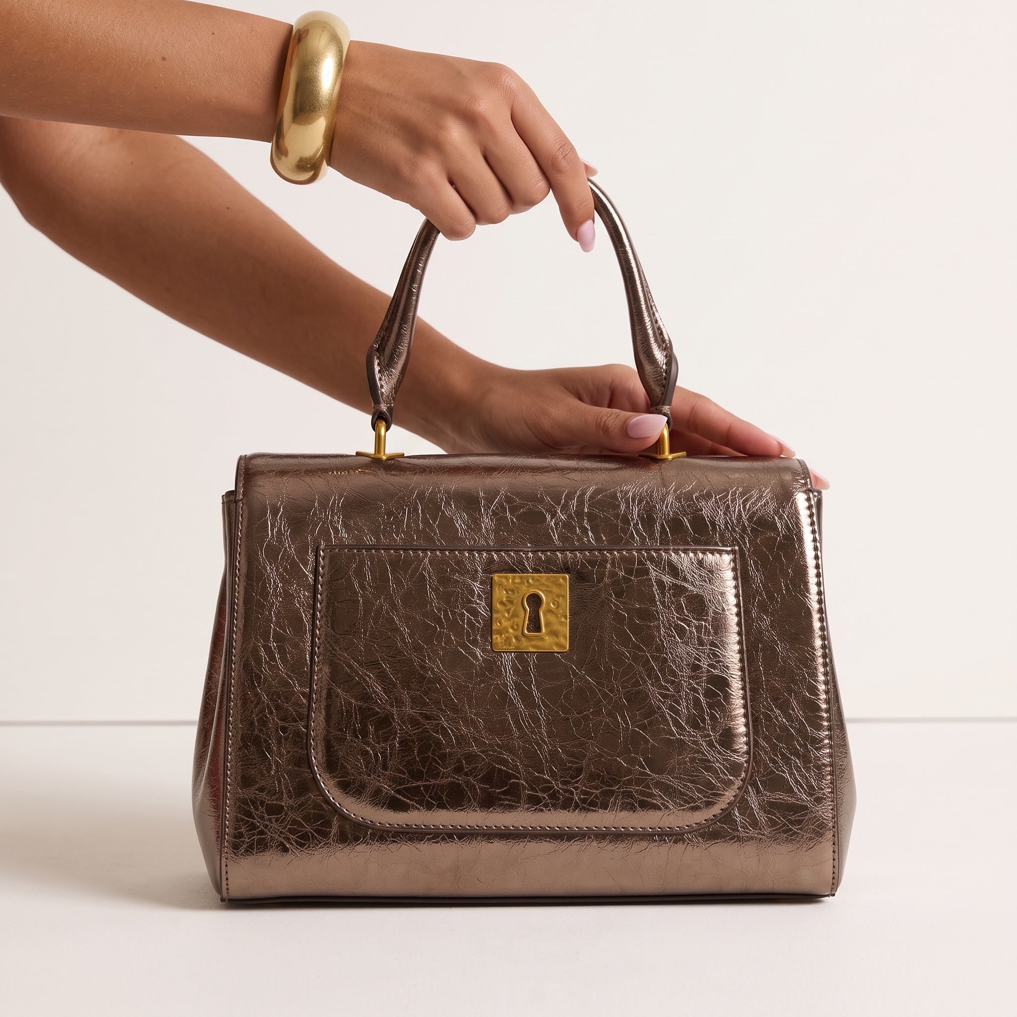 metallic bronze Dolce&Gabbana Sicily top-handle bag with gold charms