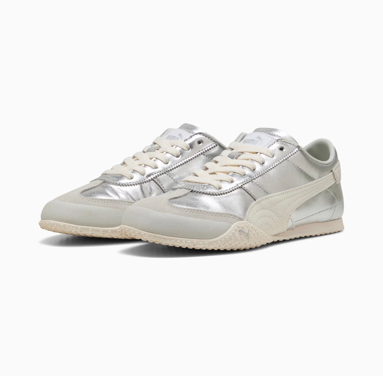 Puma low-profile silver metallic trainer with cream formstrip and textured off-white sole