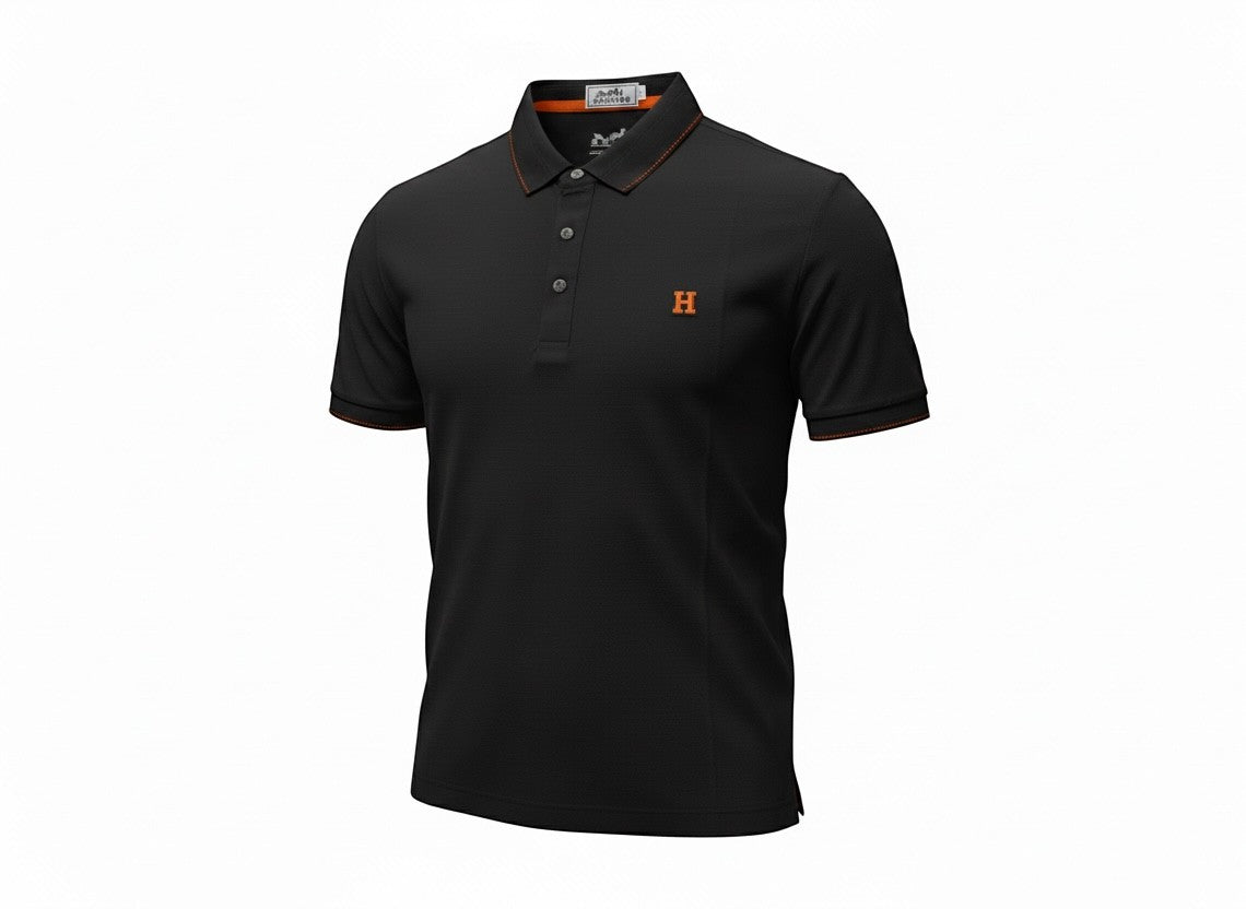 MASTERPIECE black polo shirt with orange trim and embroidered H logo. Textured fabric, classic collar, button placket.