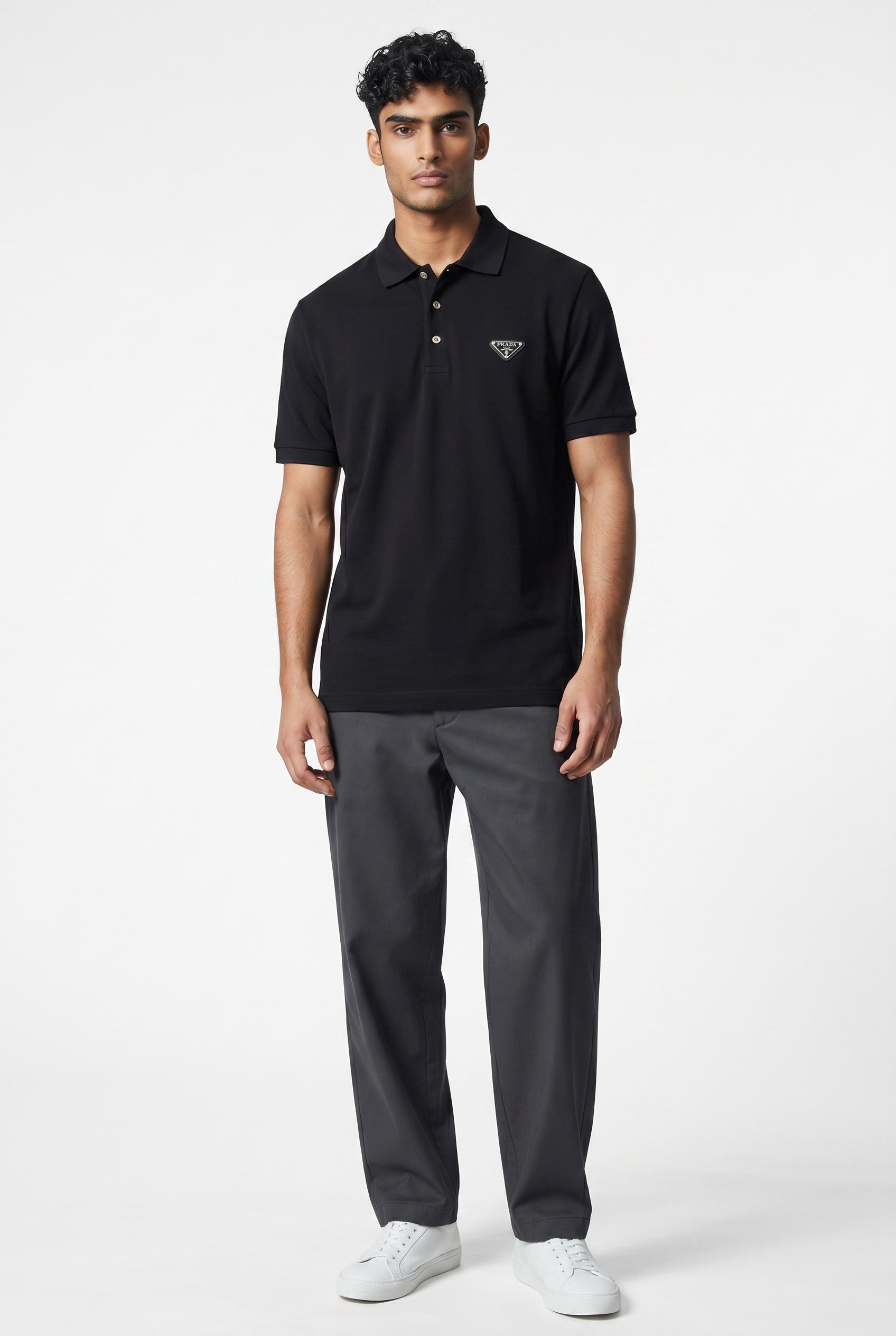MASTERPIECE black stretch-fabric polo shirt with classic collar, button placket, and subtle chest logo. Slim fit.