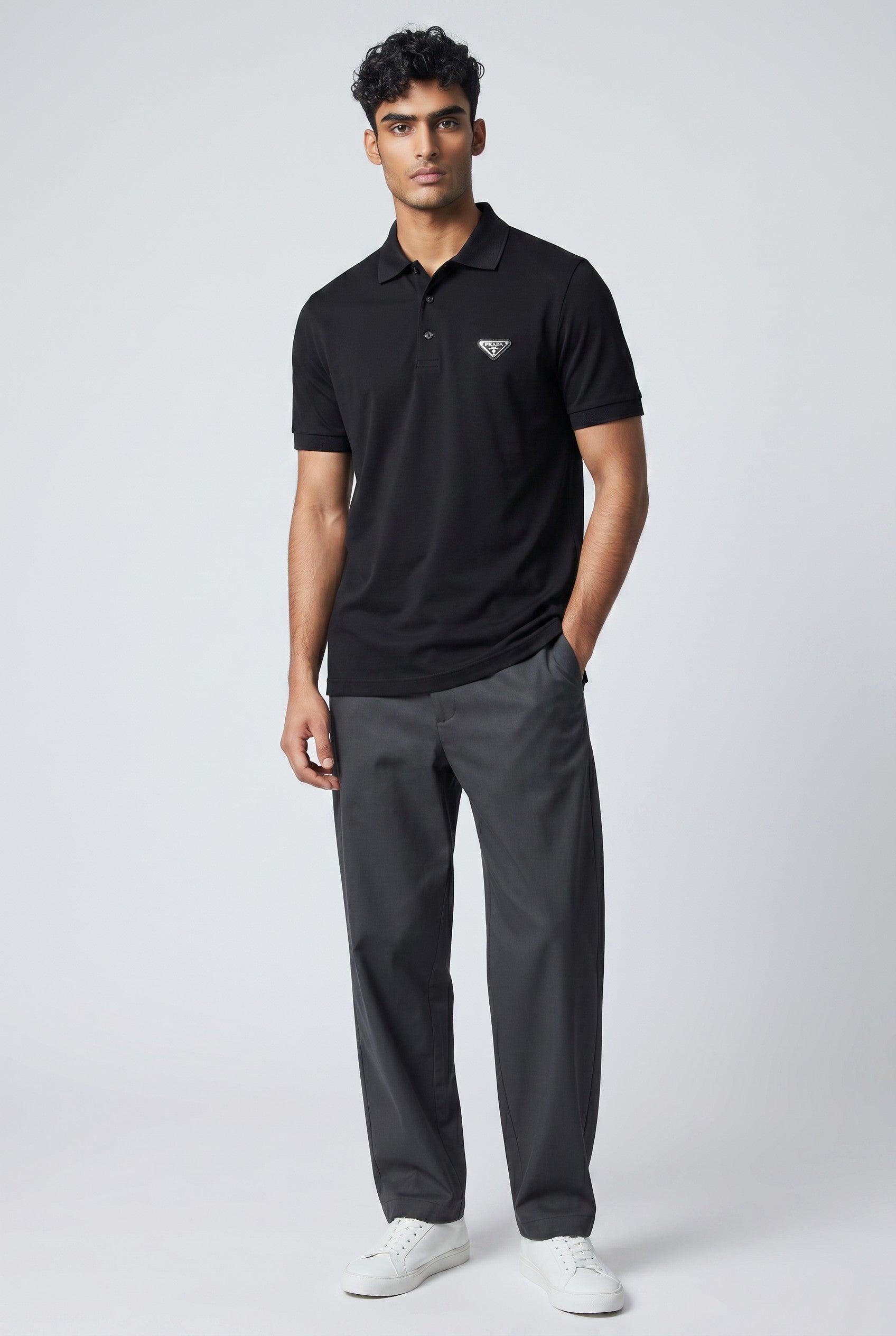 MASTERPIECE black short-sleeve polo shirt with classic Prada logo on chest and button placket.