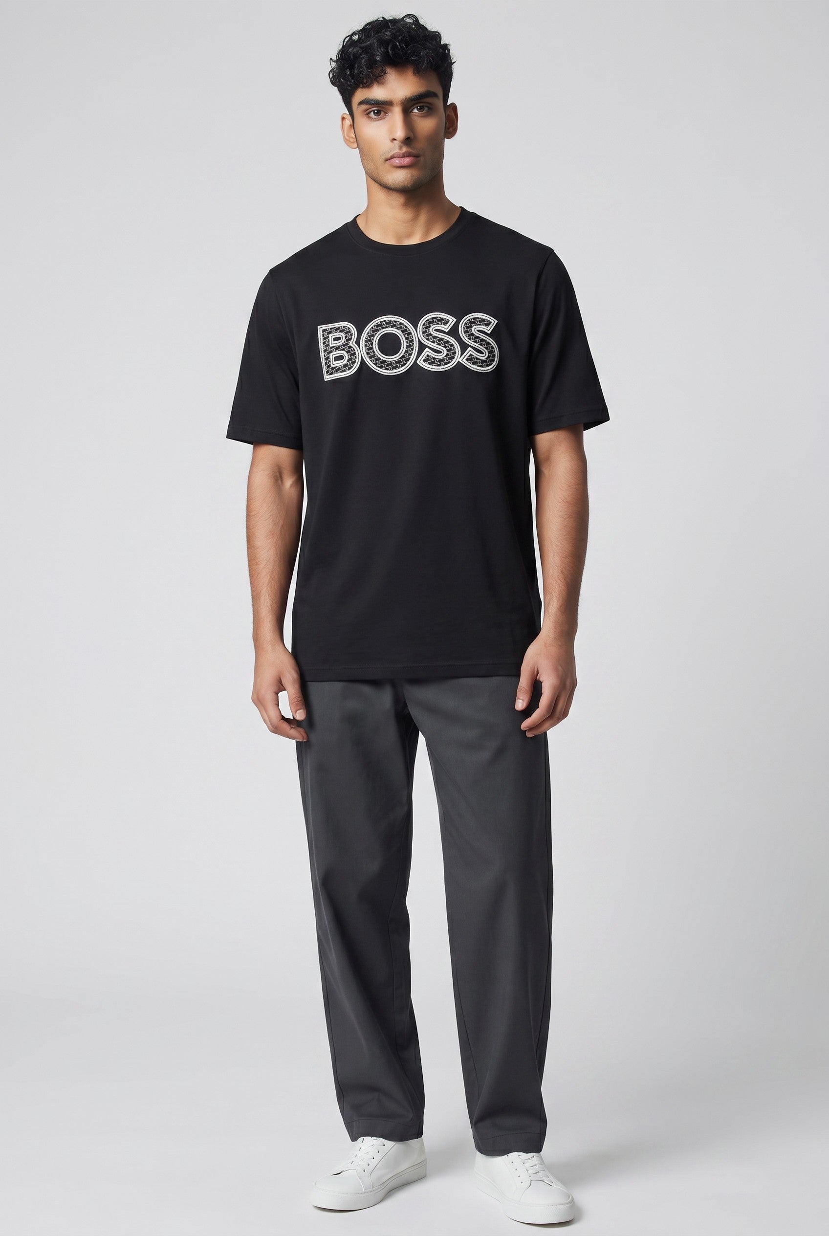 MASTERPIECE black cotton t-shirt with textured BOSS logo on chest, crew neck, short sleeves.