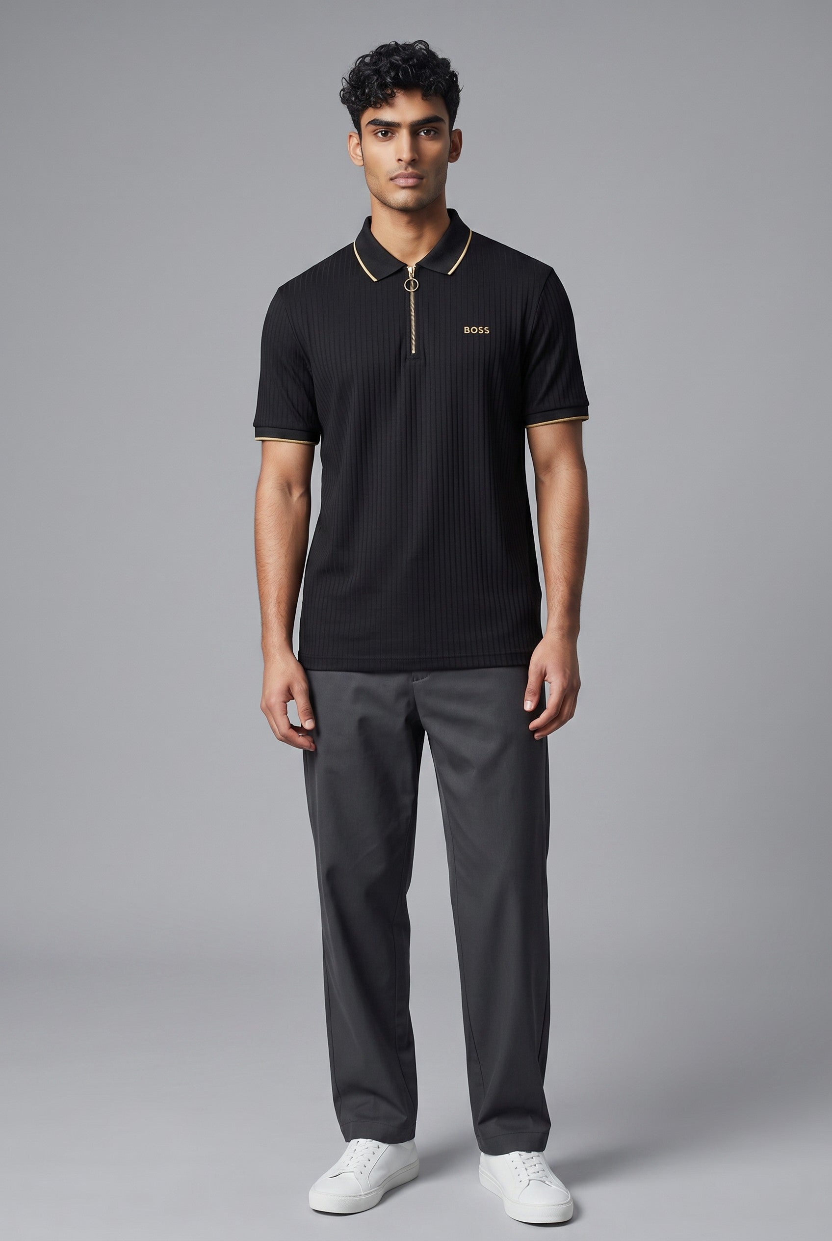 MASTERPIECE BOSS black ribbed polo shirt with gold zip and collar trim, short sleeves, tailored fit.