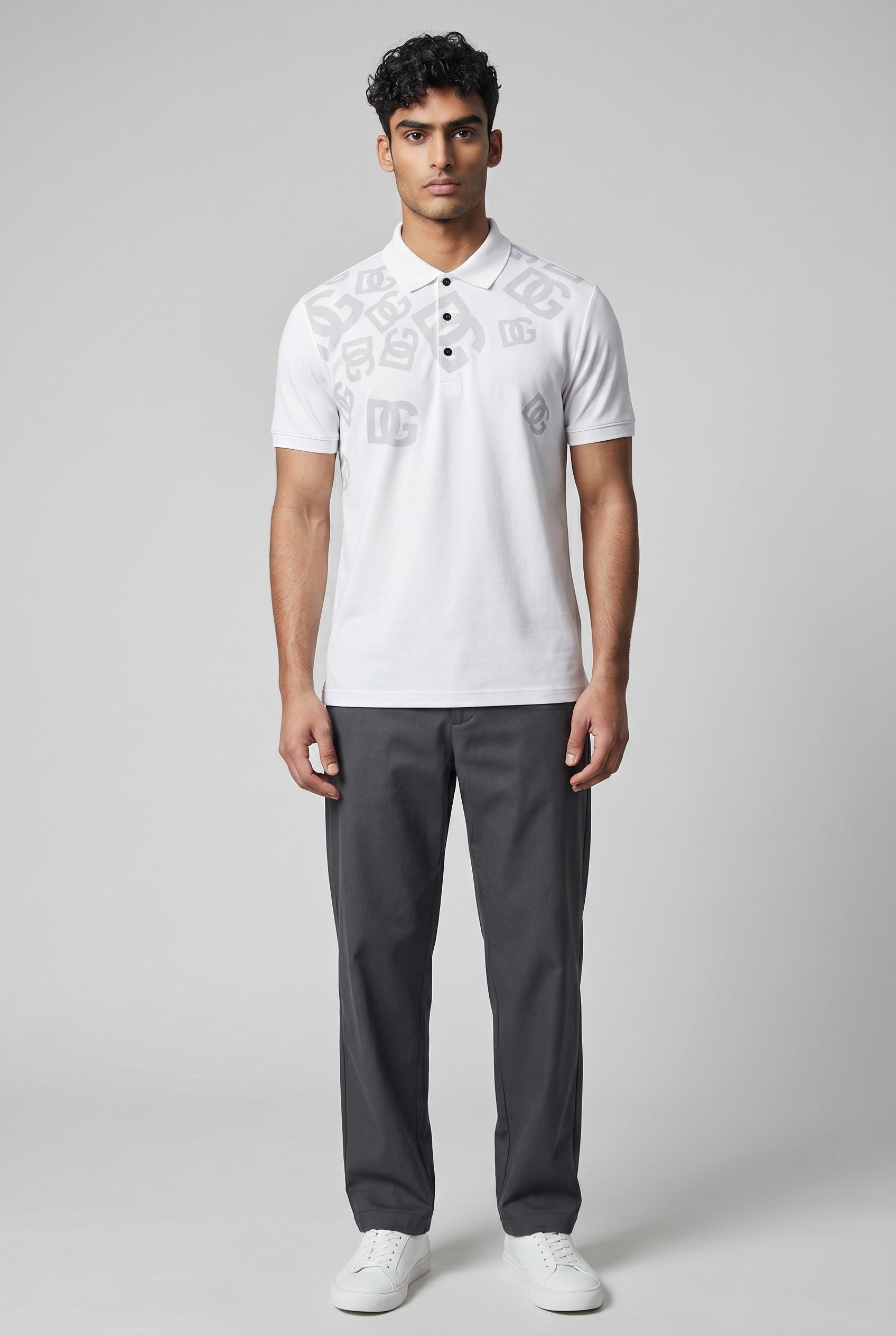 MASTERPIECE Dolce & Gabbana white polo shirt with all-over subtle DG monogram print and black buttons.