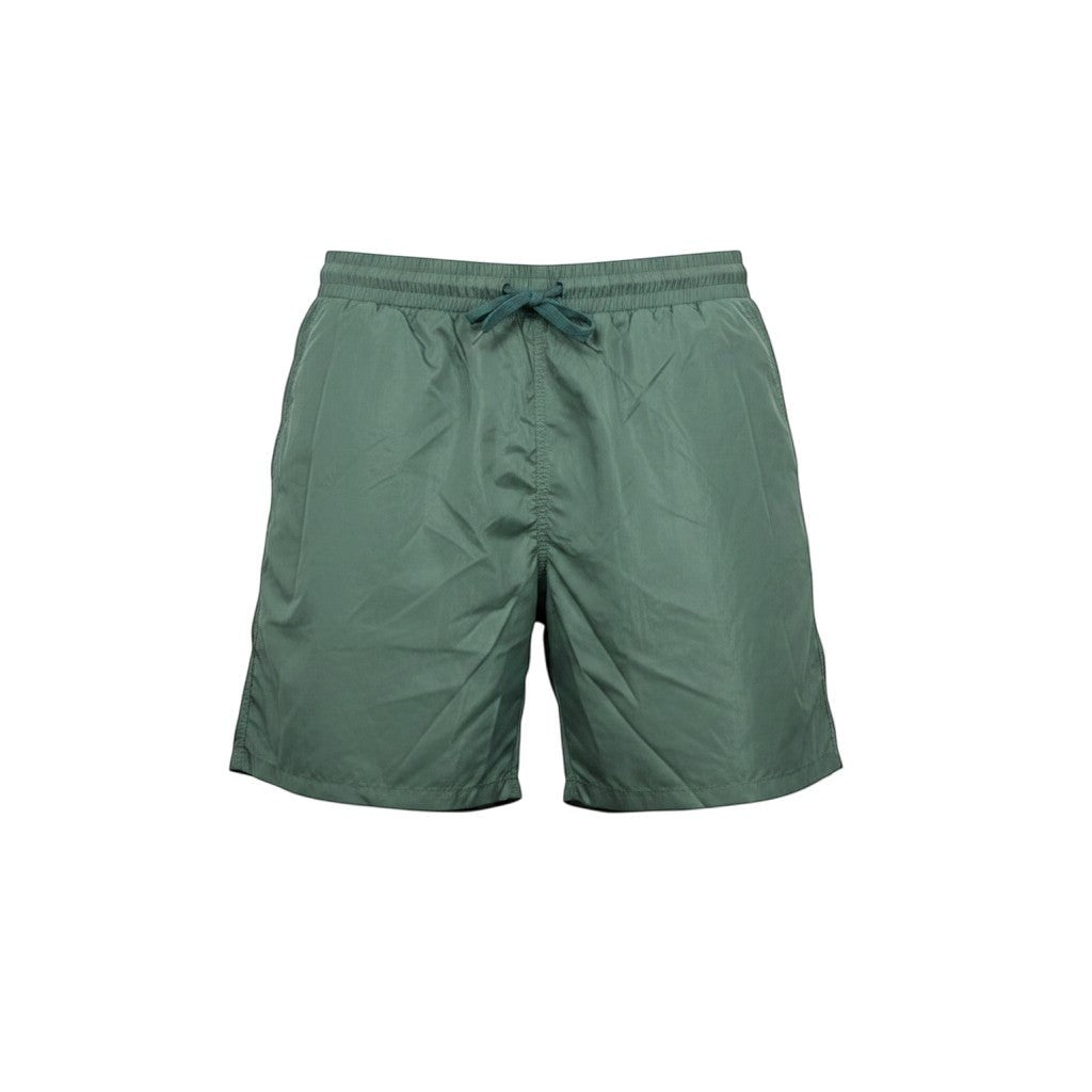 MASTERPIECE green technical fabric swim shorts with tonal monogram pattern and drawstring waist.