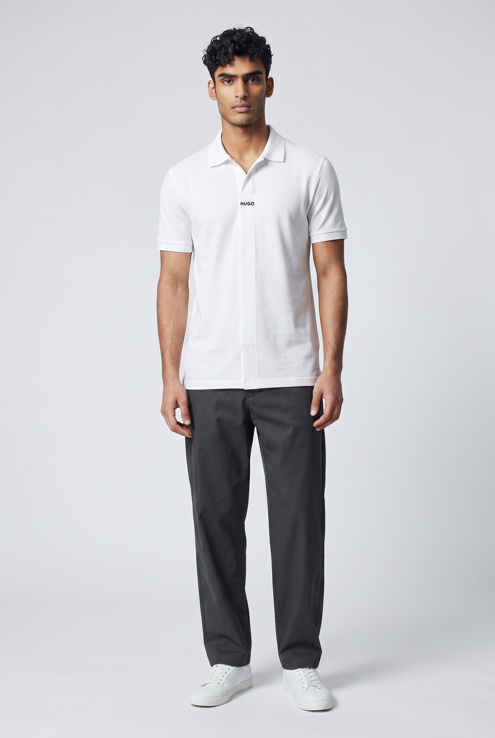 MASTERPIECE HUGO white short-sleeve polo shirt with subtle all-over monogram pattern and structured collar.