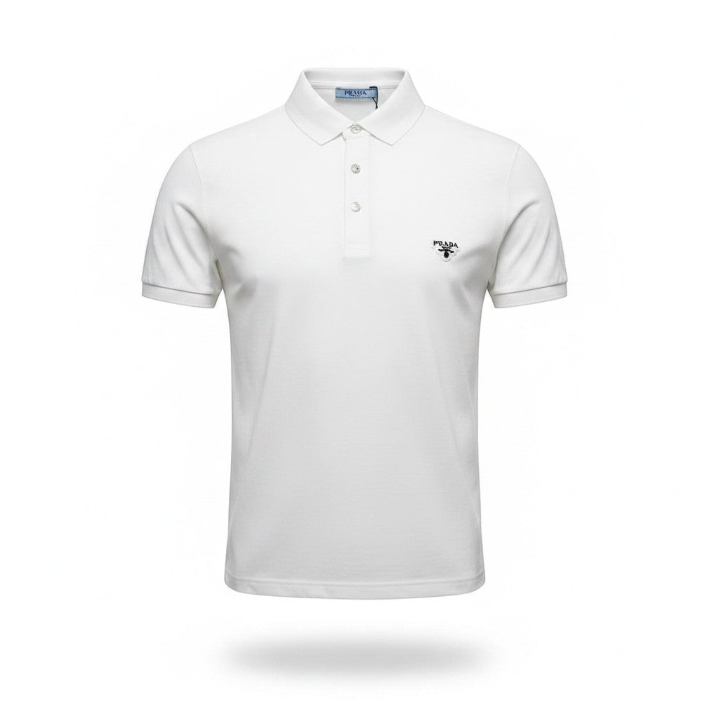 MASTERPIECE Prada white cotton polo shirt with classic collar and signature chest logo. Short sleeves, tailored fit.