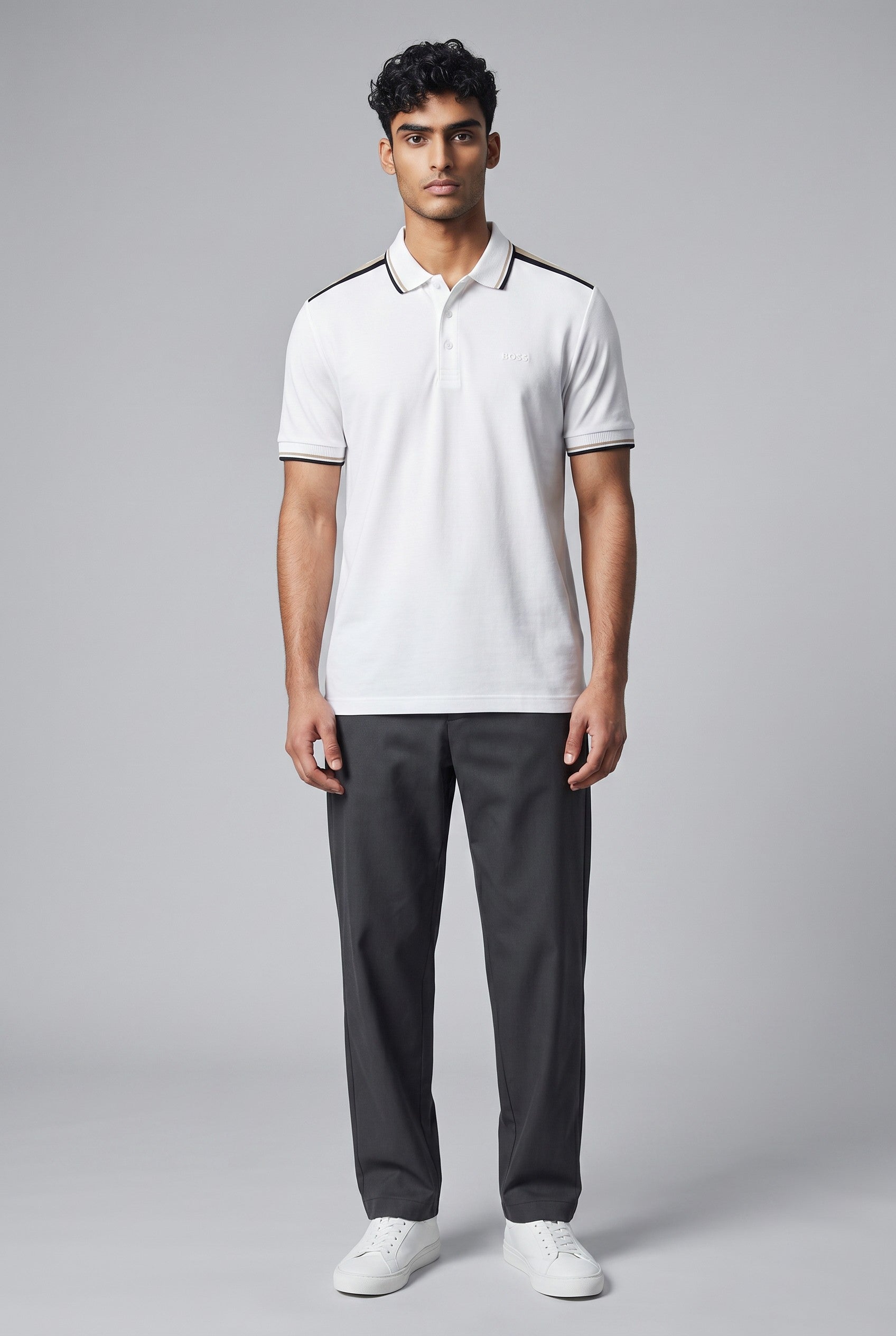 MASTERPIECE white BOSS polo shirt with black shoulder stripes and minimal chest logo. Breathable fabric, classic collar.