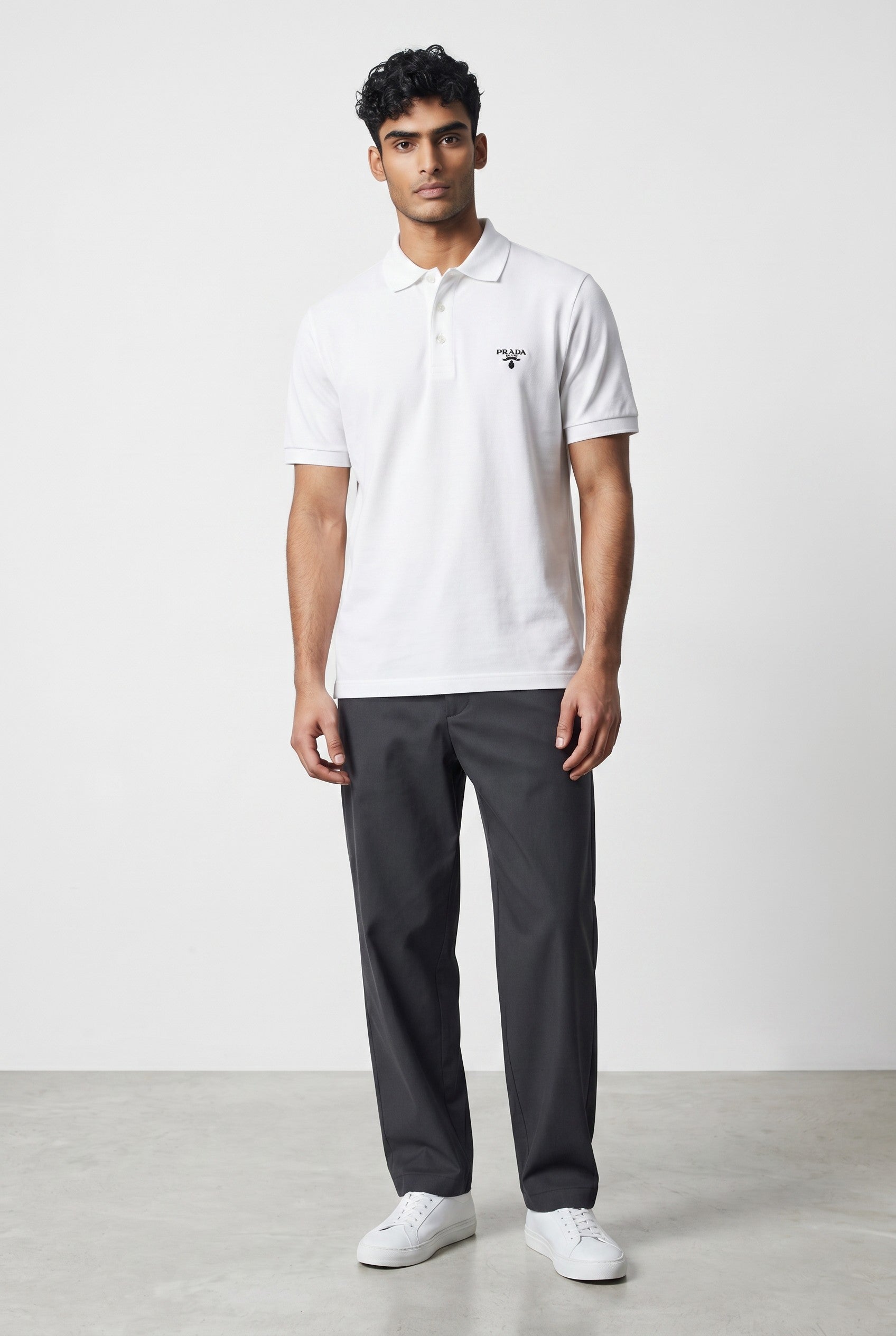 MASTERPIECE white cotton polo shirt with classic collar and signature Prada logo on chest.
