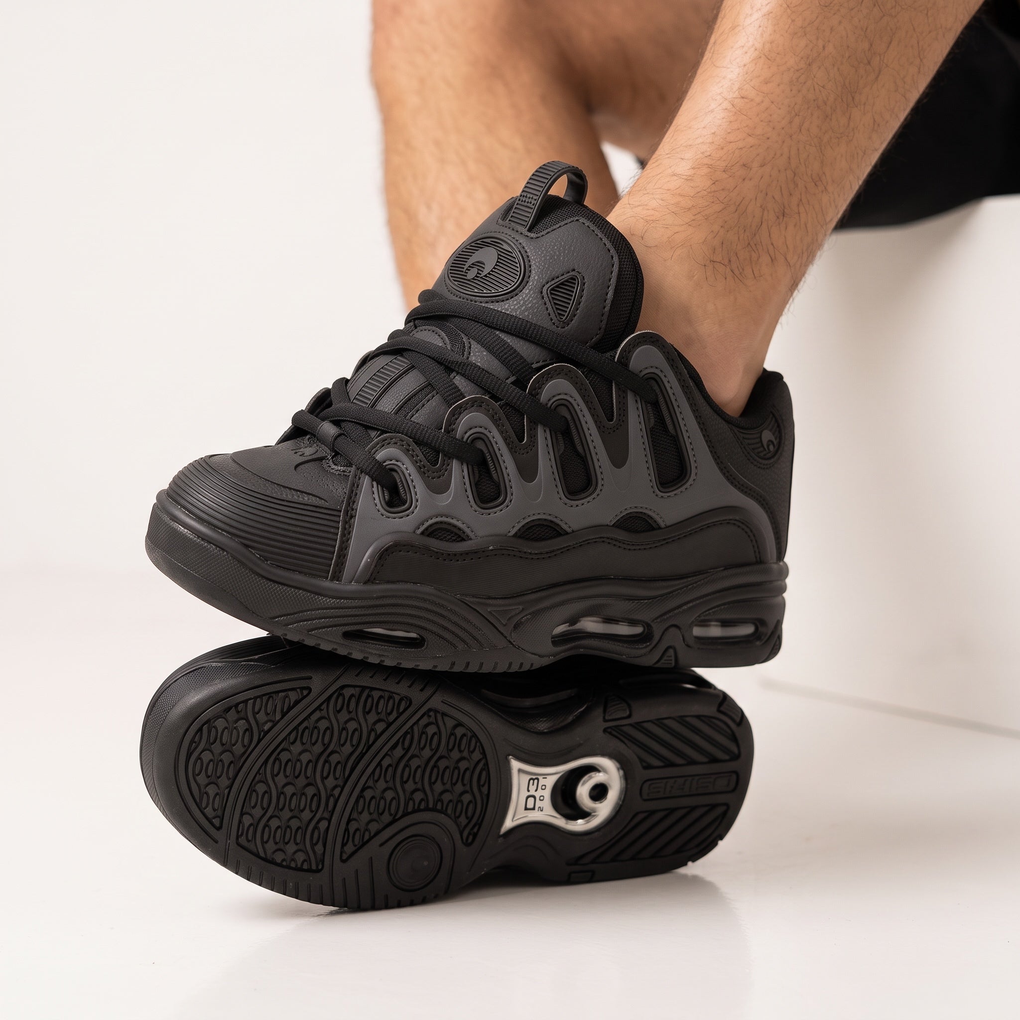 Osiris D3 2001 triple black chunky sneakers with sculpted sole and layered panels