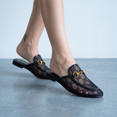 black Gucci mesh mule loafer with gold horsebit hardware