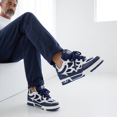 Louis Vuitton navy and white chunky trainer with monogram floral motif
