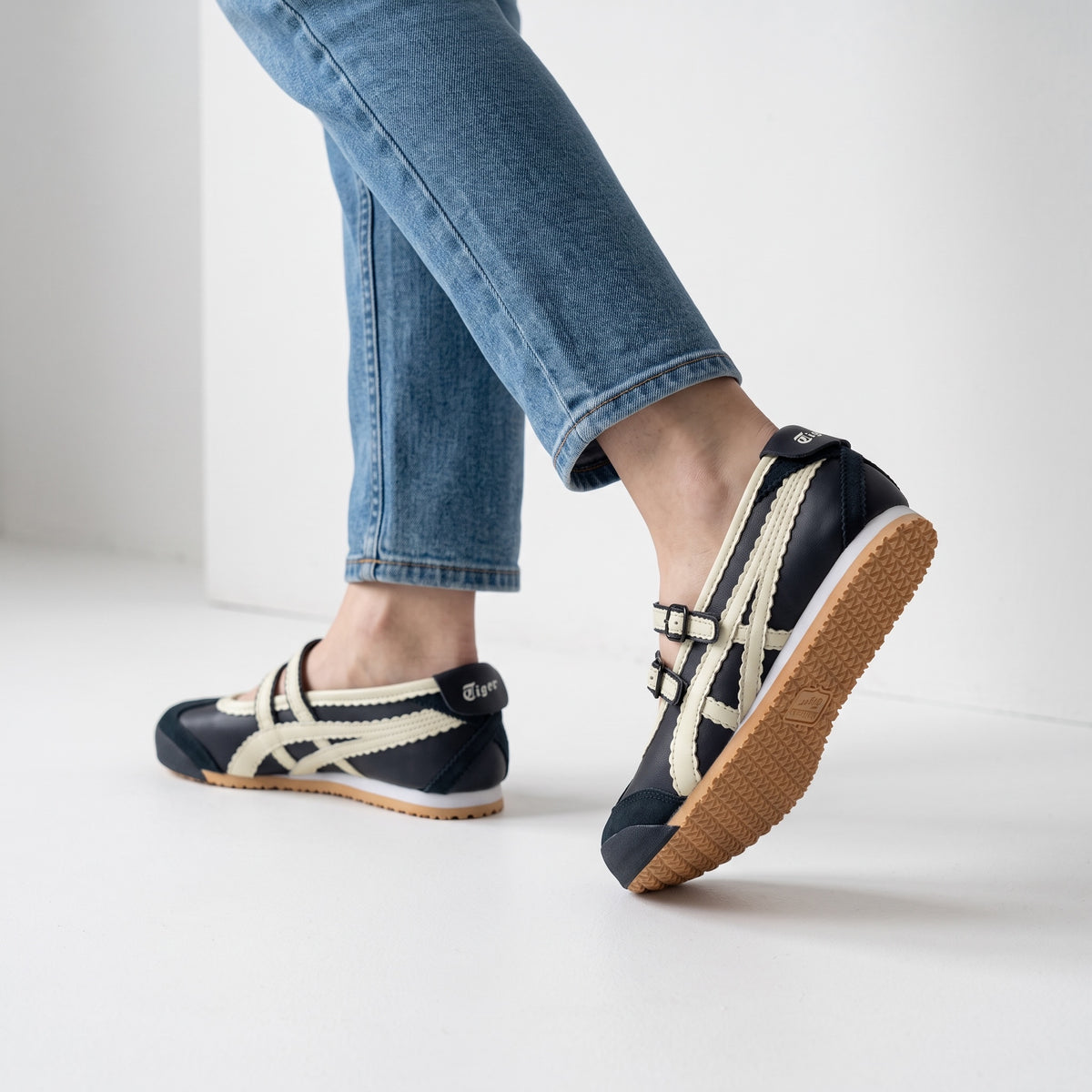 Onitsuka Tiger navy and cream Mary Jane sneakers with triple buckles and gum sole