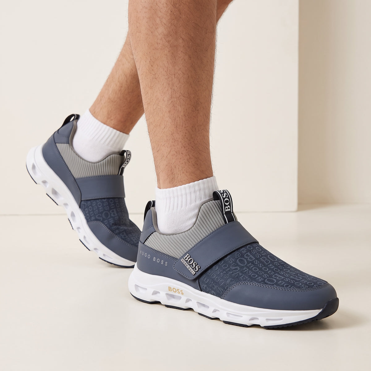 Hugo Boss blue monogram slip-on trainers with chunky white sole