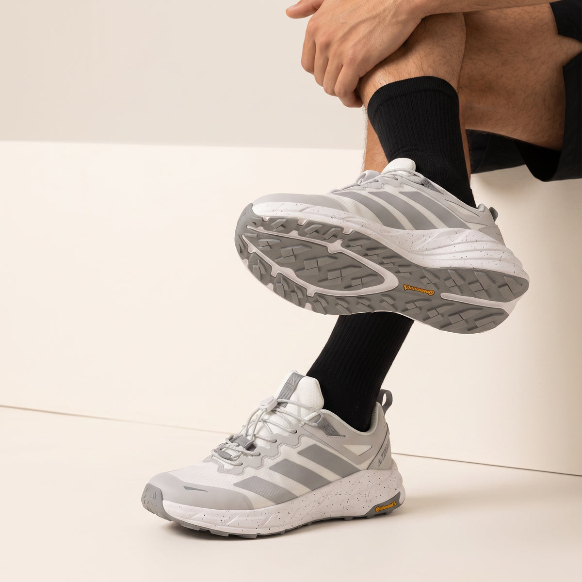 Adidas Terrex white and grey trail running sneaker with Continental outsole and toggle lacing