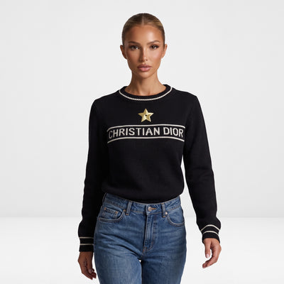 Black Christian Dior knit sweater with white trim and gold star applique