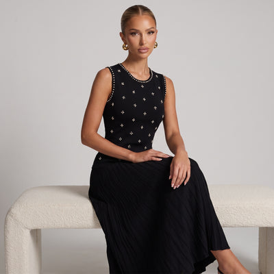 black sleeveless knit tank with pearl-like studs