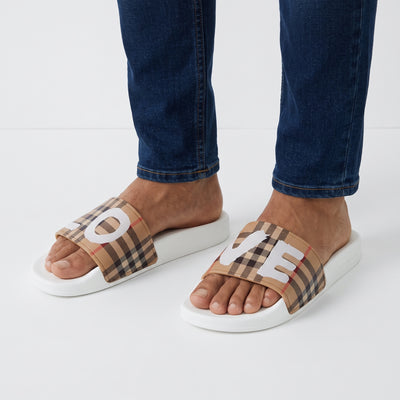 Burberry beige check slide sandals with white logo and white sole
