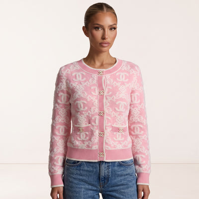 Pink Chanel cardigan with CC logo buttons and allover CC motif