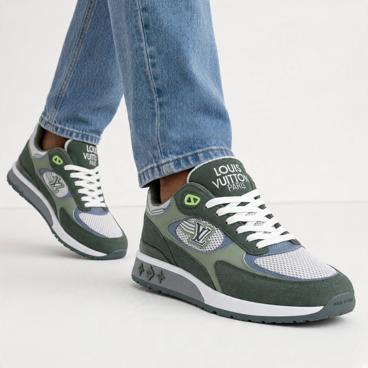 green Louis Vuitton low-top chunky sneakers with mesh panels and LV logo