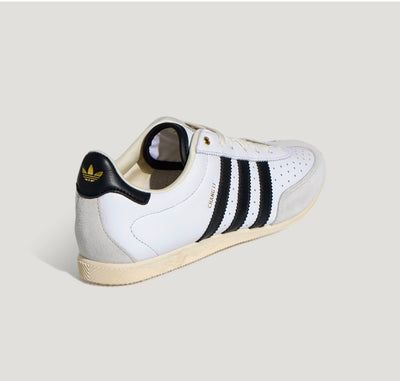 Adidas Chang Le white trainer with black stripes and pale grey suede toe